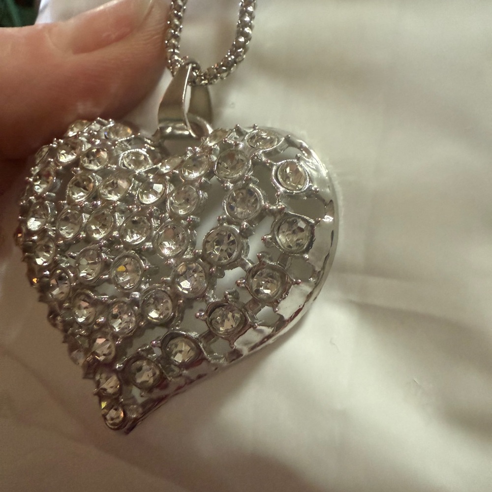 Elegant Silver Heart Pendant Necklace with sparkly crystals.